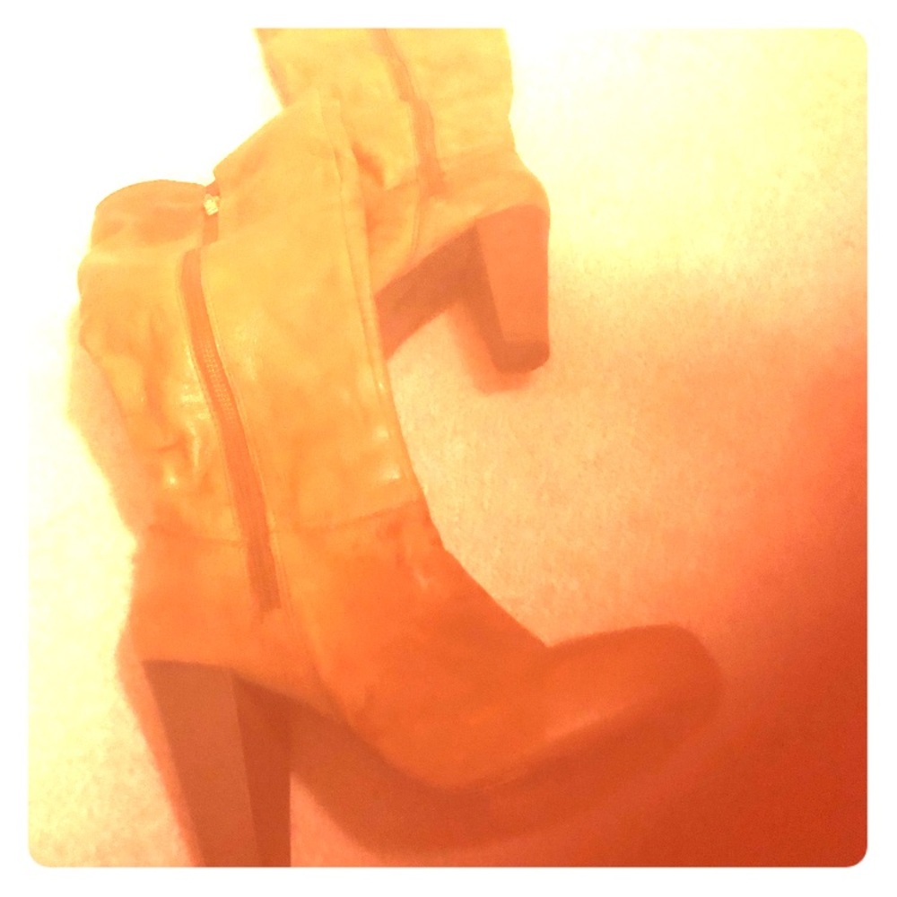 Heeled brown leather boots size 7.5